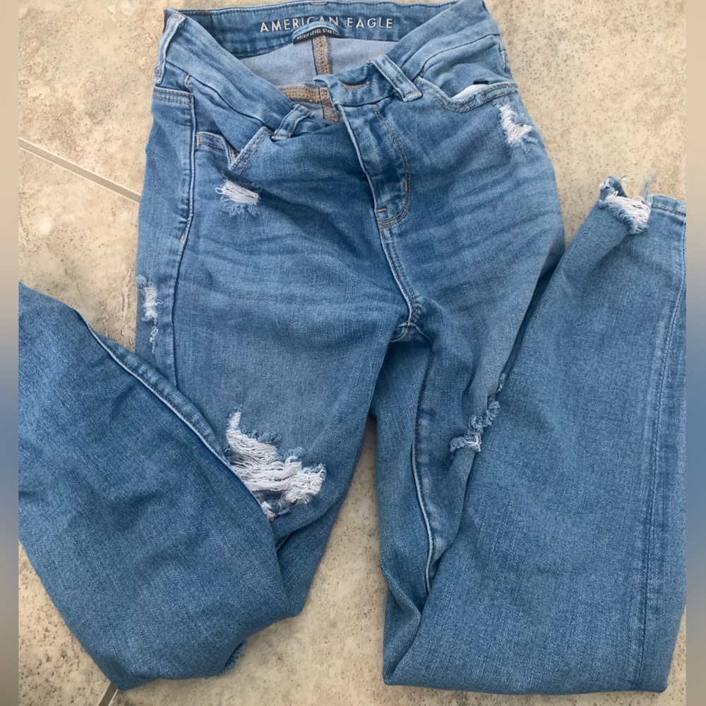1 pair of american eagle jeans and 1 pair of american eagle shorts.